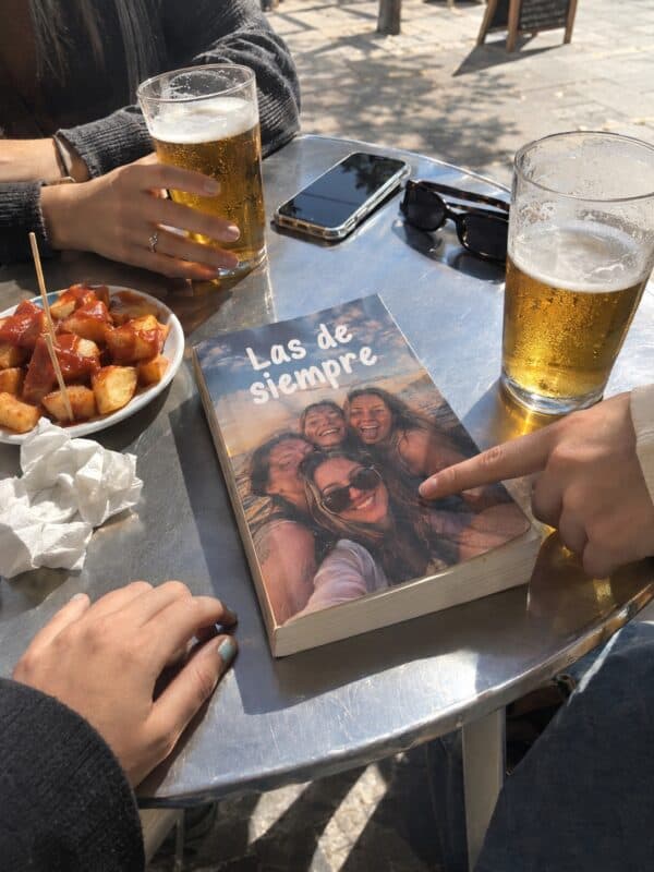 Softcover WhatsApp book with a group photo of friends on the cover