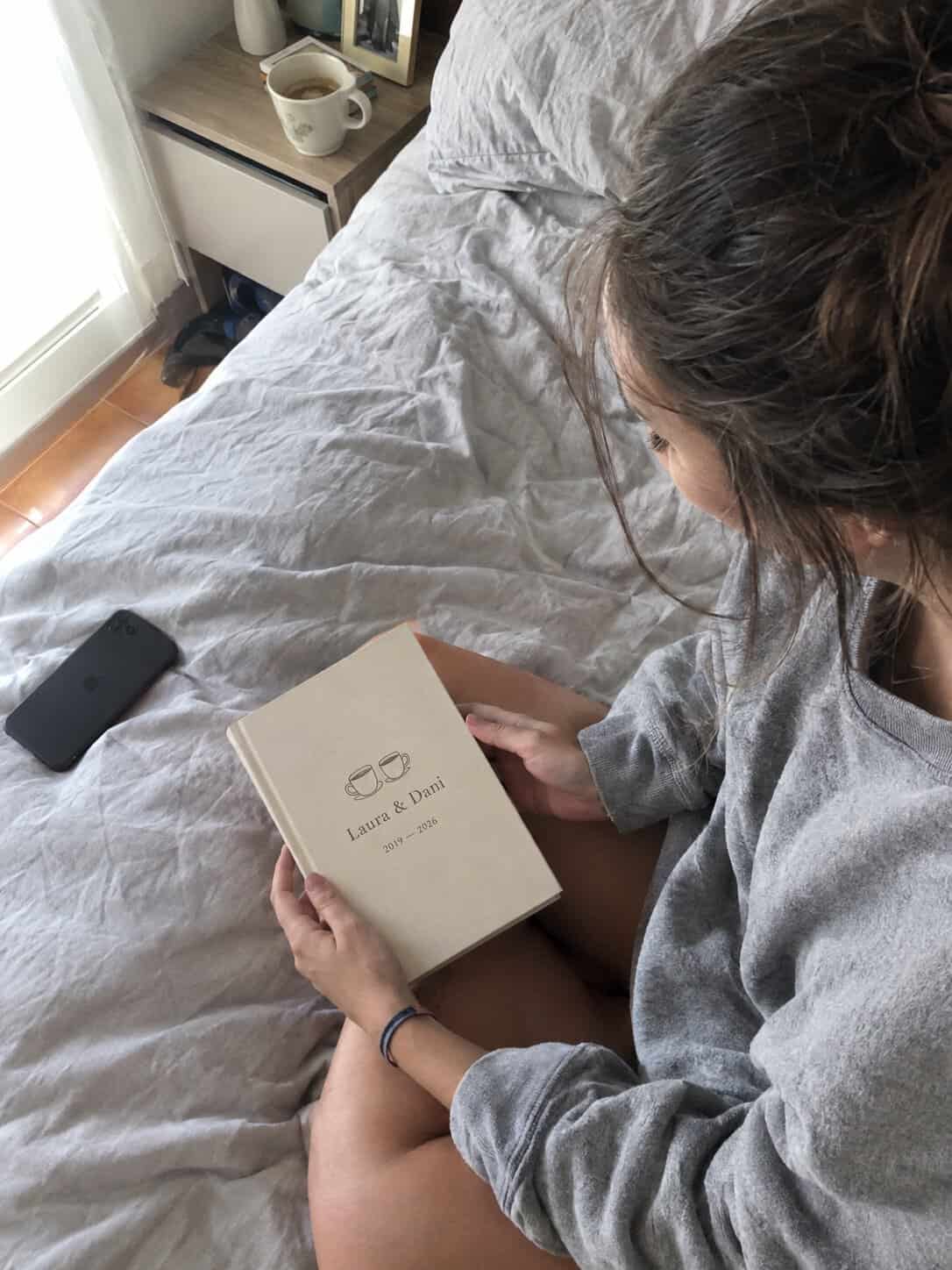 paper anniversary gift: hardcover book of the couple’s conversations